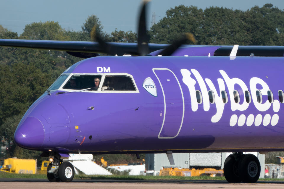 EXETER, ENGLAND - OCTOBER 18: A aircraft operated by the airline Flybe, taxis down the runway at Exeter Airport near Exeter on October 18, 2018 in Devon, England. The value of shares in the Exeter-based airline Flybe, have fallen dramatically recently after the company issued another profit warning, blaming poor demand, a weaker pound and higher fuel costs.(Photo by Matt Cardy/Getty Images)