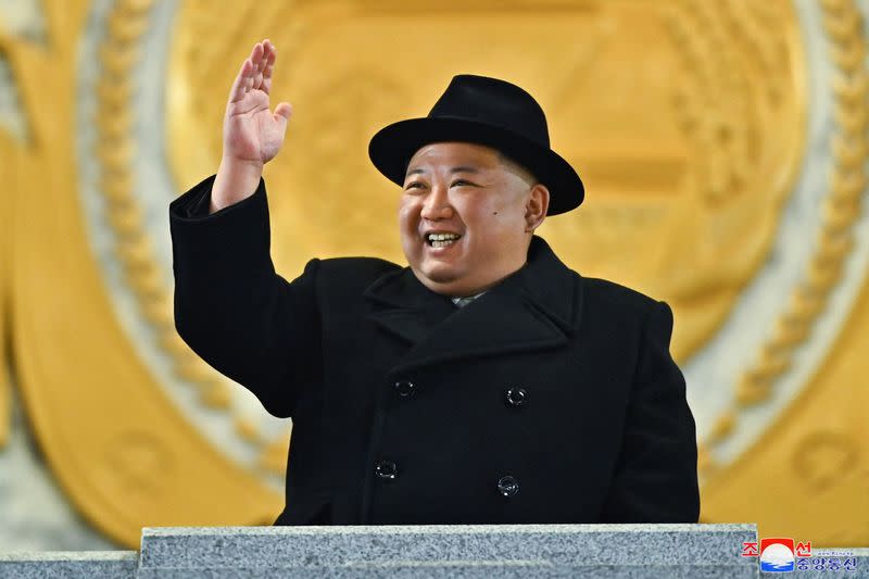 Kim Jong Un watches a military parade to mark the founding anniversary of North Korea's army, at Kim Il Sung Square in Pyongyang.