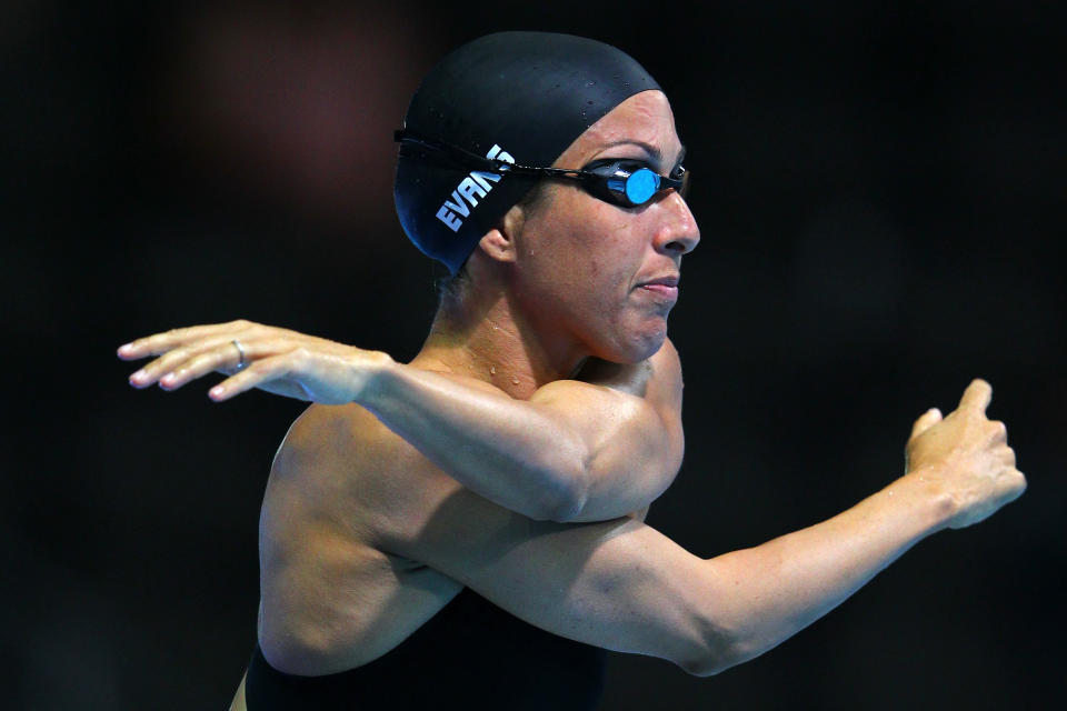 OMAHA, NE - JUNE 26: Janet Evans stretches prior to swimming in preliminary heat 6 of the Women's 400 m Freestyle during Day Two of the 2012 U.S. Olympic Swimming Team Trials at CenturyLink Center on June 26, 2012 in Omaha, Nebraska. (Photo by Al Bello/Getty Images)
