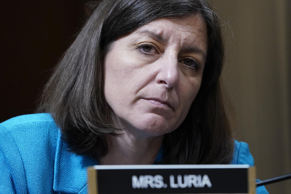 FILE - Rep. Elaine Luria, D-Va., listens as the House select committee investigating the Jan. 6, 2021, attack on the Capitol holds a hearing at the Capitol in Washington, Thursday, June 16, 2022. Crowded Republican congressional primaries in Virginia’s 2nd and 7th districts, on Tuesday, June 21, 2022, will settle who takes on centrist Democrats Luria and Abigail Spanberger in November’s general elections, which in turn could help determine which party controls the U.S. House. (AP Photo/Susan Walsh, File)