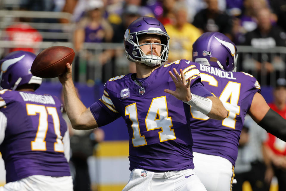 Minnesota Vikings quarterback Sam Darnold (14) throws a pass during the first half of an NFL football game against the Houston Texans, Sunday, Sept. 22, 2024, in Minneapolis. (AP Photo/Bruce Kluckhohn)