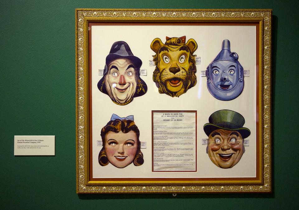 In this Tuesday, Oct. 8, 2013 photo, a set of masks of characters in the movie, "The Wizard of Oz" is displayed at the Farnsworth Museum, in Rockland, Maine. The world's largest collection of materials from the movie is being exhibited a few months after the release of a prequel to the original film and the release of the original movie in I-Max format. (AP Photo/Robert F. Bukaty)