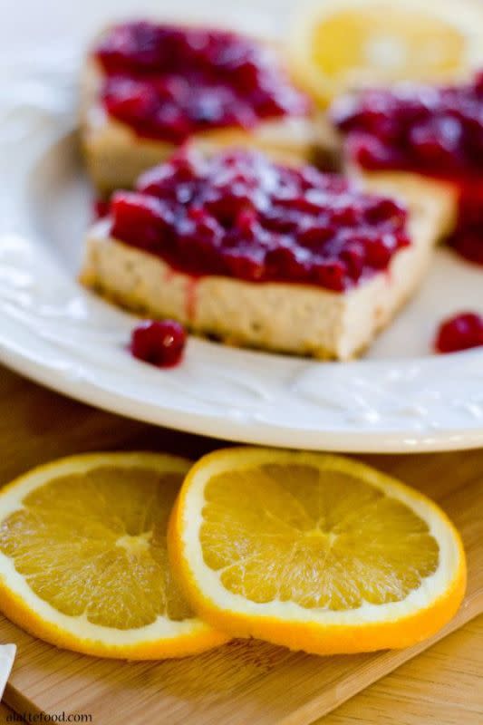 <p>A Latte Food</p><p>These rich cheesecake bars start with a cinnamon graham cracker crust, have a cinnamon cheesecake center, and an amazing orange-cranberry topping.</p><p><strong>Get the recipe: <a href="https://www.alattefood.com/cranberry-cinnamon-spiced-cheesecake-bars/" rel="nofollow noopener" target="_blank" data-ylk="slk:Cranberry Cinnamon Spiced Cheesecake Bars;elm:context_link;itc:0;sec:content-canvas" class="link ">Cranberry Cinnamon Spiced Cheesecake Bars</a></strong></p>