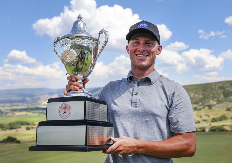 BYU golfer Zac Jones poses with the trophy after he defeated Simon Kwon in match play at the 124th Utah State Amateur Championship at Soldier Hollow Golf Course in Midway on Saturday, July 16, 2022. Jones will be among the Cougars competing in the NCAA Championships this week in Arizona. | Scott G Winterton, Deseret News