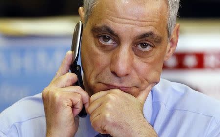 Chicago Mayor Rahm Emanuel calls potential voters at a phone bank on election day in Chicago, Illinois, February 24, 2015. REUTERS/Jim Young