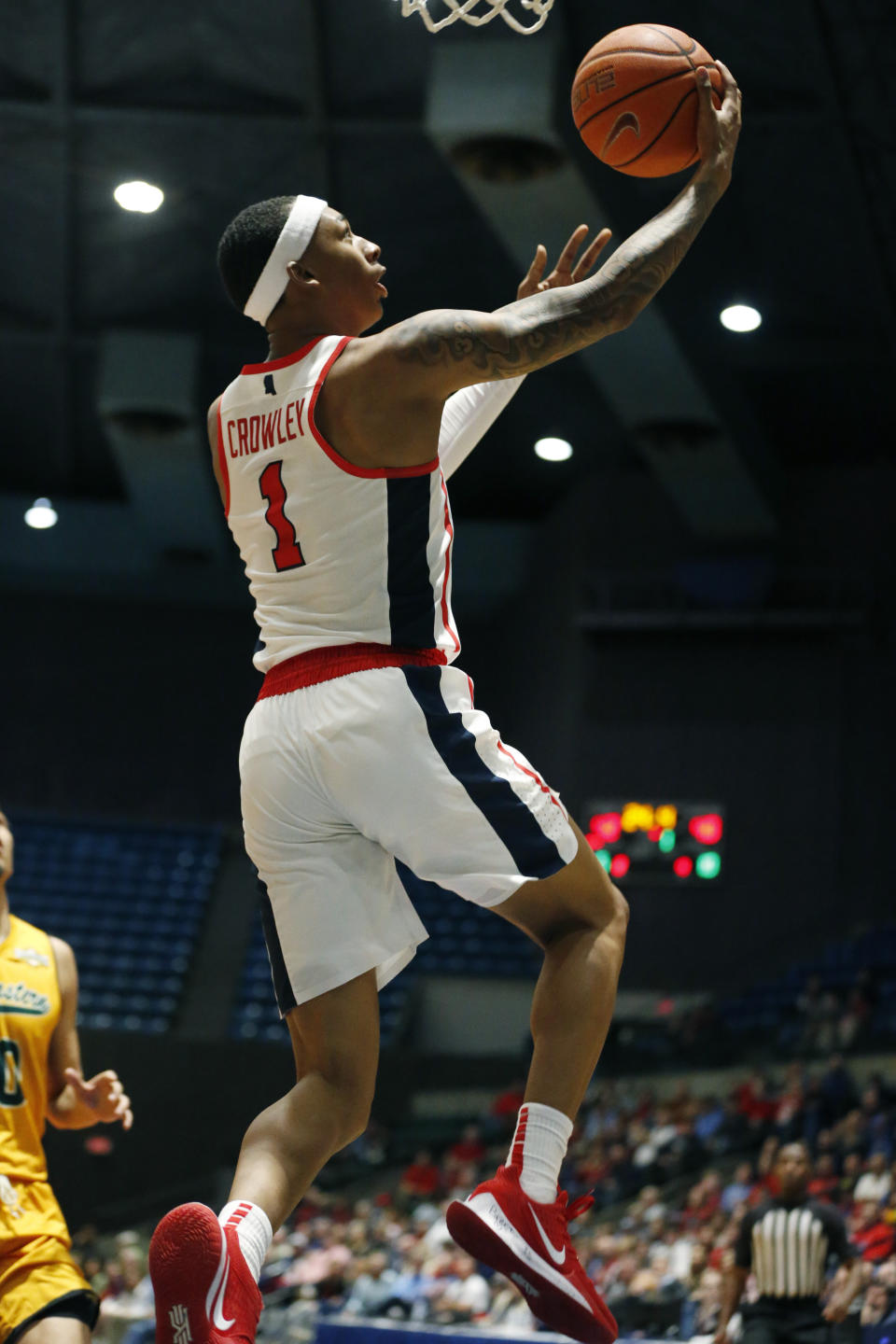 Mississippi guard Austin Crowley (1) scores on a layup against Southeastern Louisiana during the first half of an NCAA college basketball game, Saturday, Dec. 21, 2019, in Jackson, Miss. Mississippi won 83-76.(AP Photo/Rogelio V. Solis)