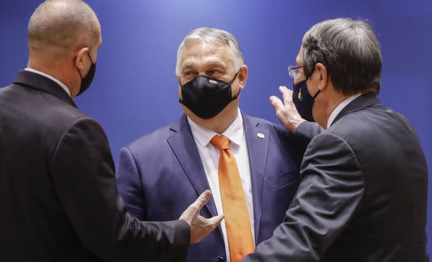 Hungarian Prime Minister Viktor Orban (C) and Cyprus President of the Republic Nicos Anastasiades (R) chat on the first day of a European Union (EU) summit at The European Council Building in Brussels on June 24, 2021. - . (Photo by Olivier HOSLET / POOL / AFP) (Photo by OLIVIER HOSLET/POOL/AFP via Getty Images) (Photo: OLIVIER HOSLET via Getty Images)