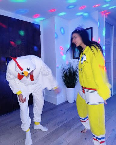 <p>Victoria Justice/Instagram</p> Victoria Justice wearing SpongeBob onesie with her friend wearing a chicken onesie