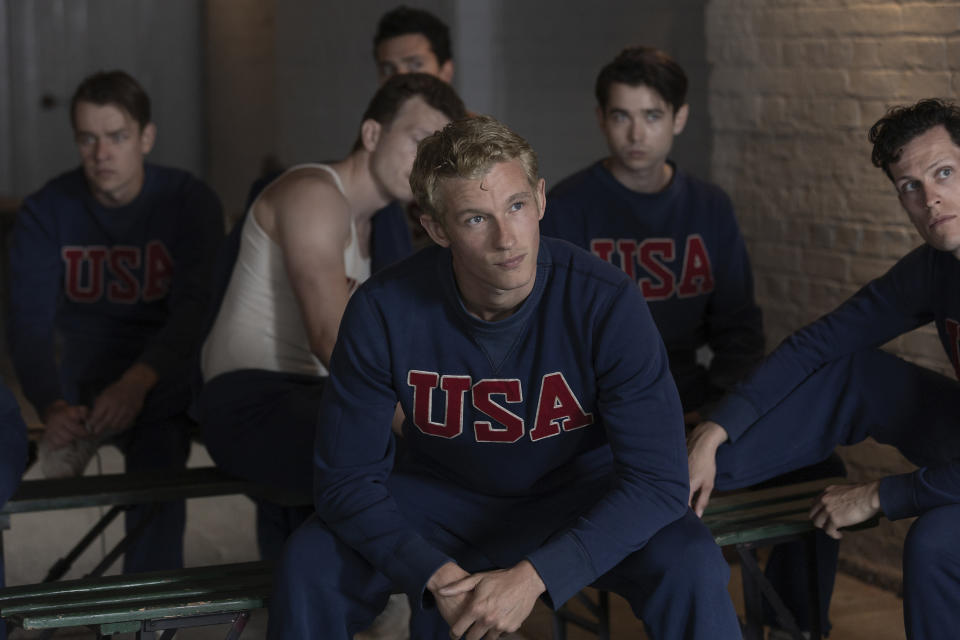 This image released by MGM Pictures shows Callum Turner, center, in a scene from "The Boys in the Boat." (Laurie Sparham/Metro-Goldwyn-Mayer Pictures via AP)