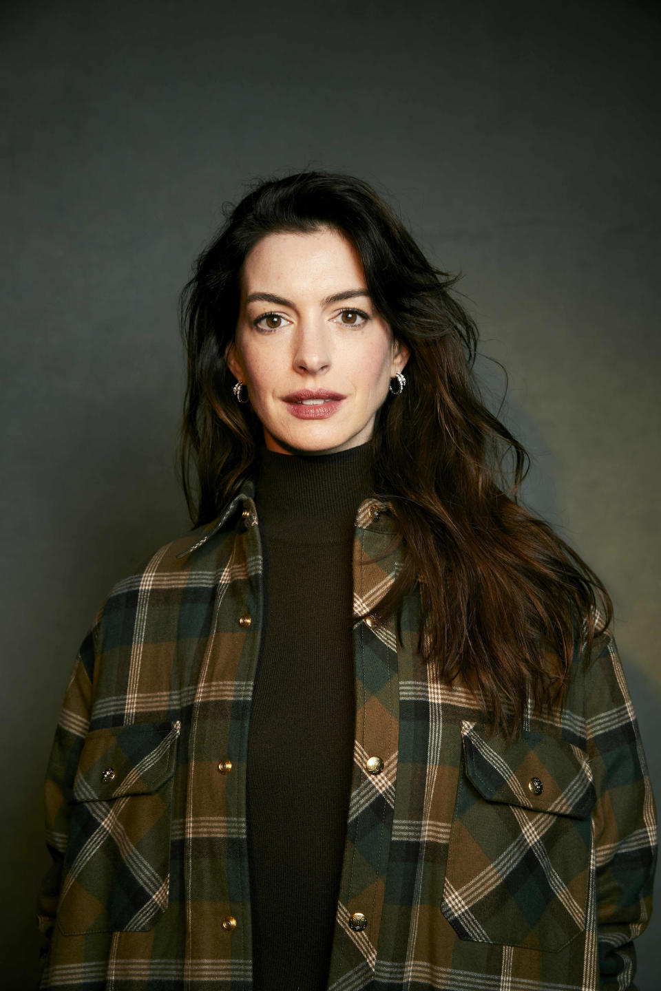 Anne Hathaway poses for a portrait to promote the film "Eileen" at the Latinx House during the Sundance Film Festival on Saturday, Jan. 21, 2023, in Park City, Utah. (Photo by Taylor Jewell/Invision/AP)