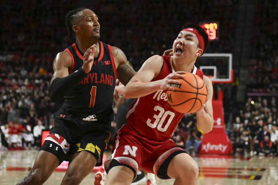 Jan 27, 2024; College Park, Maryland, USA; Nebraska Cornhuskers guard Keisei Tominaga (30) reacts while Maryland Terrapins guard Jahmir Young (1)] defends during the first half at Xfinity Center. Mandatory Credit: Tommy Gilligan-USA TODAY Sports