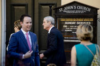 FILE - In this Sunday, April 21, 2019 file photo, special counsel Robert Mueller, center, and his wife Ann Cabell Standish, left, arrive for Easter services at St. John's Episcopal Church in Washington. St. John's was in the spotlight in 2019 when Mueller, a church regular, was photographed there shortly after submitting his final report on Russian involvement in the 2016 election. Trump had visited the church the preceding week. (AP Photo/Andrew Harnik)