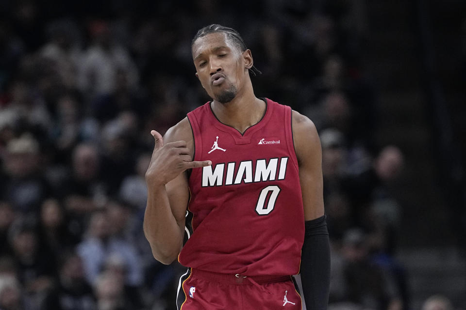 Miami Heat guard Josh Richardson (0) reacts after scoring against the San Antonio Spurs during the second half of an NBA basketball game in San Antonio, Sunday, Nov. 12, 2023. (AP Photo/Eric Gay)