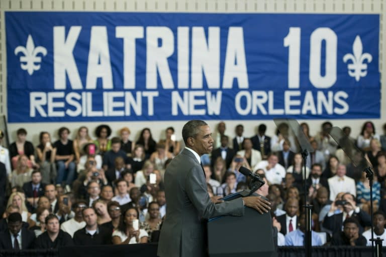 US President Barack Obama pauses while speaking about Hurricane Katrina at the Andrew P. Sanchez Community Center on August 27, 2015 in New Orleans, Louisiana