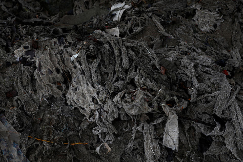 <p>Material is seen on the bank of the River Thames during low tide in London, Britain Feb. 27, 2017. (Photo: Stefan Wermuth/Reuters) </p>