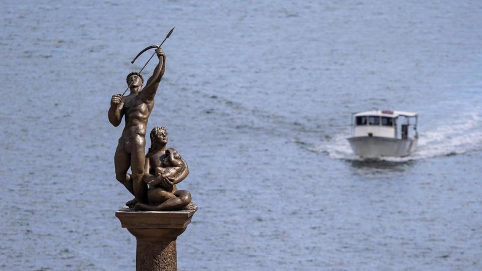 A bronze statue of a Tequesta hunter, woman and child stands on the Brickell Bridge in downtown Miami as a tribute to the indigenous tribe that occupied the mouth of the Miami River 2,000 years ago. A new archaeological excavation by the bridge has unearthed evidence that indigenous occupation of the site dates back 7,000 years ago.