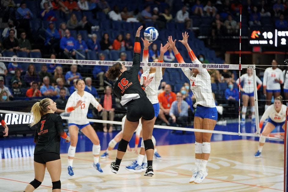 FAMU outside hitter Dominique Washington (16) looks to score a point versus Florida. The Rattlers lost 3-0 to the Gators in the first round of the NCAA volleyball tournament on Thursday, Dec. 2, 2021.