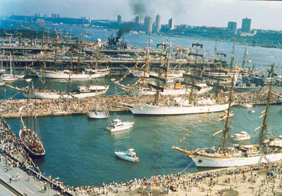 Visiting tall ships pictured in the harbor on July 4, 1976. AP