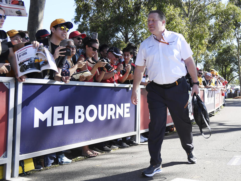 Zak Brown, CEO of McLaren, arrives at the track for the Australian Formula One Grand Prix in Melbourne, Thursday, March 12, 2020. McLaren says it has withdrawn from the season-opening Australian Grand Prix in Melbourne after a team member tested positive for the coronavirus. (AP Photo/Andy Brownbill)