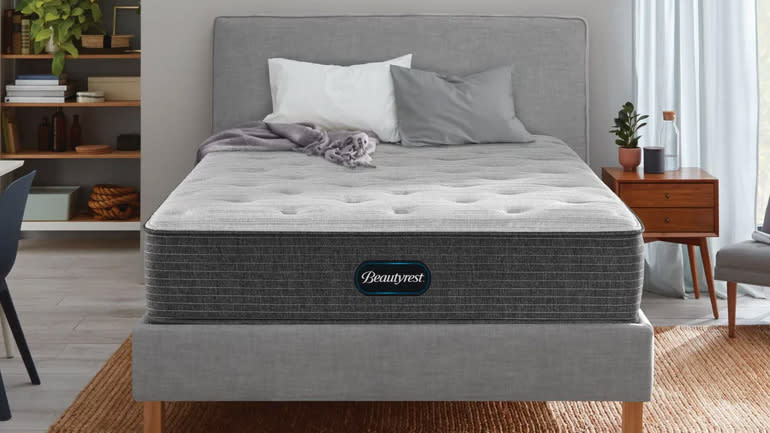  Beautyrest Select Mattress placed on a grey bedframe on a jute rug. 