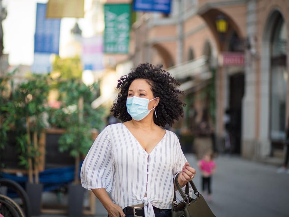 Female traveler Europe face mask