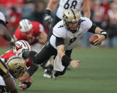 MADISON, WI - NOVEMBER 05: Robert Marve #9 of the Purdue Boilermakers is brought down by Ethan Armstrong #36 of the Wiscons Badgers at Camp Randall Stadium on November 5, 2011 in Madison Wisconsin. (Photo by Jonathan Daniel/Getty Images)