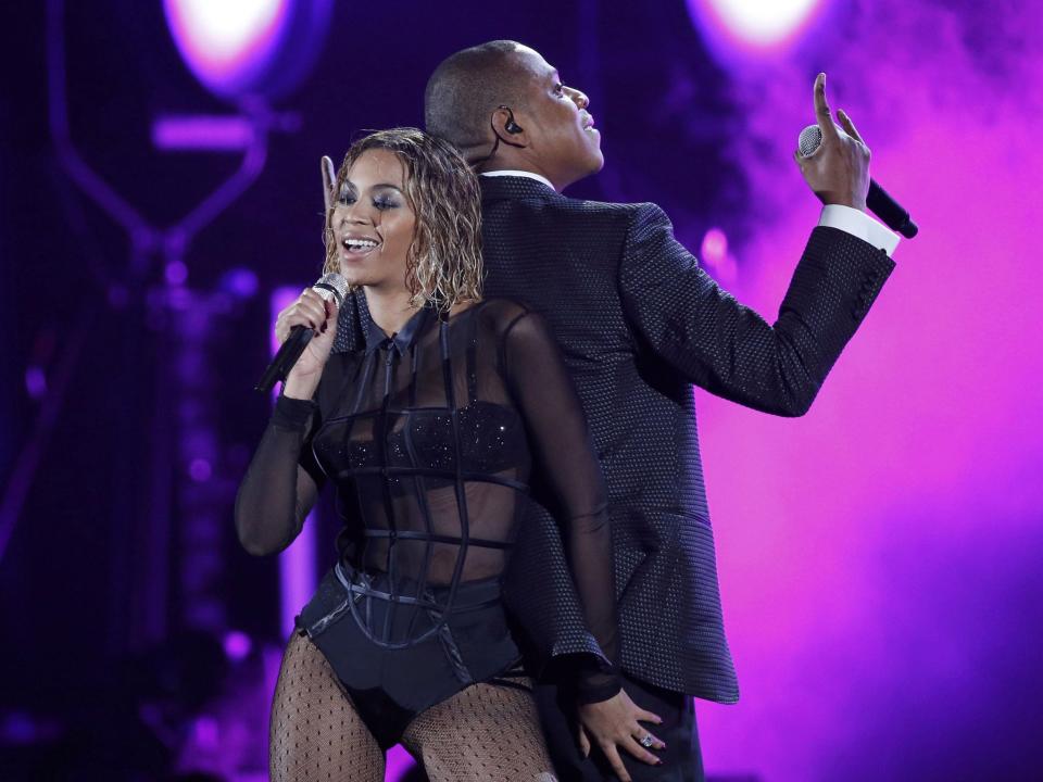 <p>Beyonce performs ‘Drunk in Love’ alongside husband rapper Jay Z at the 2014 Grammys</p>Mario Anzuoni/Reuters