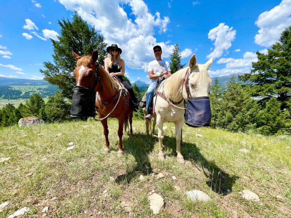 Melissa Persling and her ex-boyfriend, Jim, riding horses in Montana.