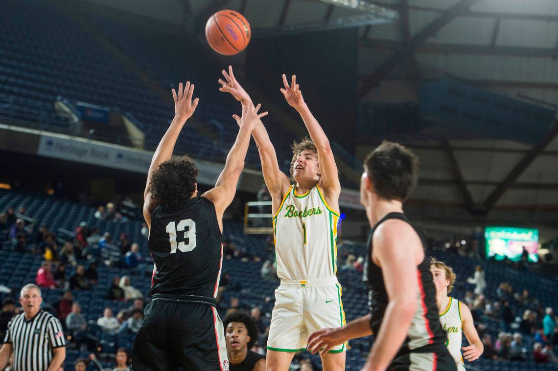 Richland guard Landen Northrop (1) puts up a shot in the fourth quarter against Union in the opening round of the Class 4A boys state basketball tournament on Wednesday, March 1, 2023 at the Tacoma Dome in Tacoma, Wash.