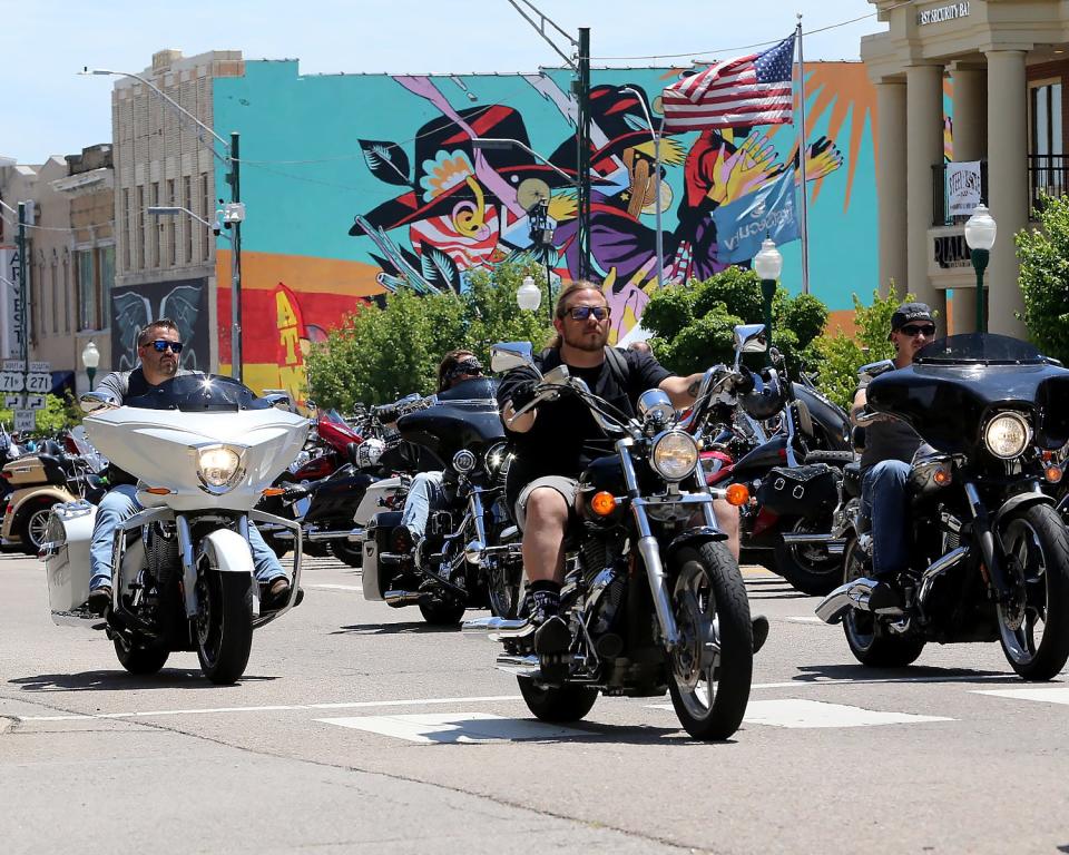 Riders cruise Garrison Ave., Saturday, May 8, during the annual Steel Horse Rally in downtown Fort Smith.