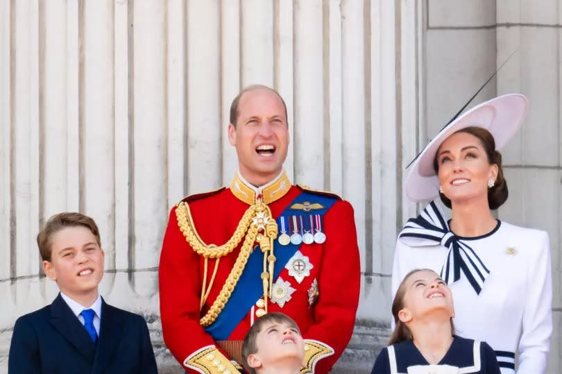 LONDON, ENGLAND - JUNE 15: Prince George of Wales, Prince William, Prince of Wales, Prince Louis of Wales, Princess Charlotte of Wales and Catherine, Princess of Wales during Trooping the Colour on June 15, 2024 in London, England. Trooping the Colour is a ceremonial parade celebrating the official birthday of the British Monarch. The event features over 1,400 soldiers and officers, accompanied by 200 horses. More than 400 musicians from ten different bands and Corps of Drums march and perform in perfect harmony. (Photo by Samir Hussein/WireImage)