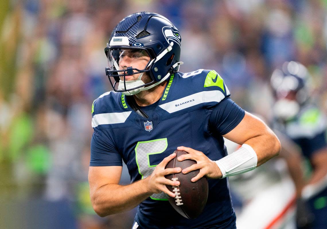 Seattle Seahawks quarterback Sam Howell scrambles during the first quarter of the preseason game against the Cleveland Browns at Lumen Field, on Saturday, Aug. 24, 2024 in Seattle, Wash.