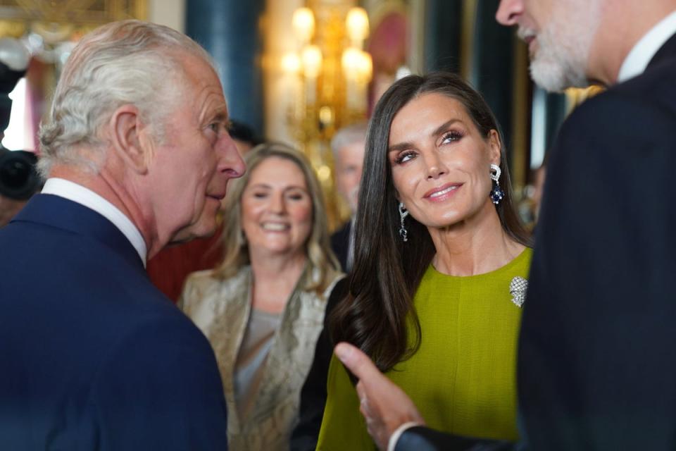 King Charles III (left) speaks to King Felipe VI and Queen Letizia of Spain, during a reception at Buckingham Palace, in London, for overseas guests attending his coronation. Picture date: Friday May 5, 2023. (PA Wire)