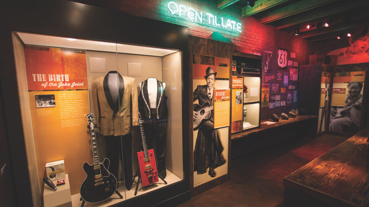 “We’re the birthplace of blues, country and rock and roll music, and the guitar is at the core of all of it”: The America at the Crossroads exhibit charts the guitar’s history with instruments owned by Bo Diddley, Muddy Waters, B.B. King, and more