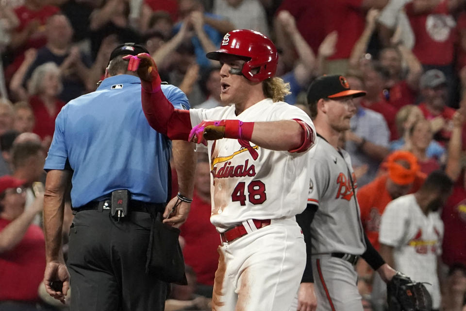 St. Louis Cardinals' Harrison Bader celebrates after scoring on an inside-the-park home run during the sixth inning of a baseball game against the Baltimore Orioles Tuesday, May 10, 2022, in St. Louis. (AP Photo/Jeff Roberson)