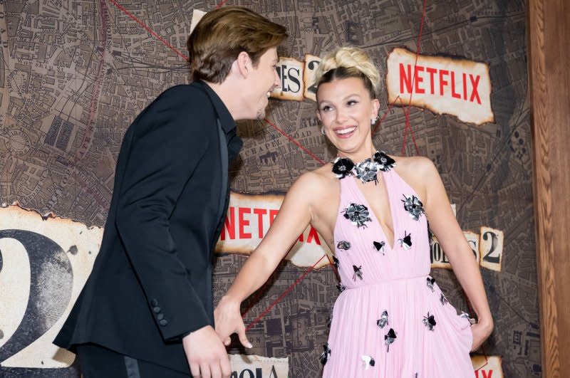 Jake Bongiovi and Millie Bobby Brown arrive on the red carpet for the world premiere of "Enola Holmes 2" at the Paris Theater in New York in 2022. File Photo by Gabriele Holtermann/UPI