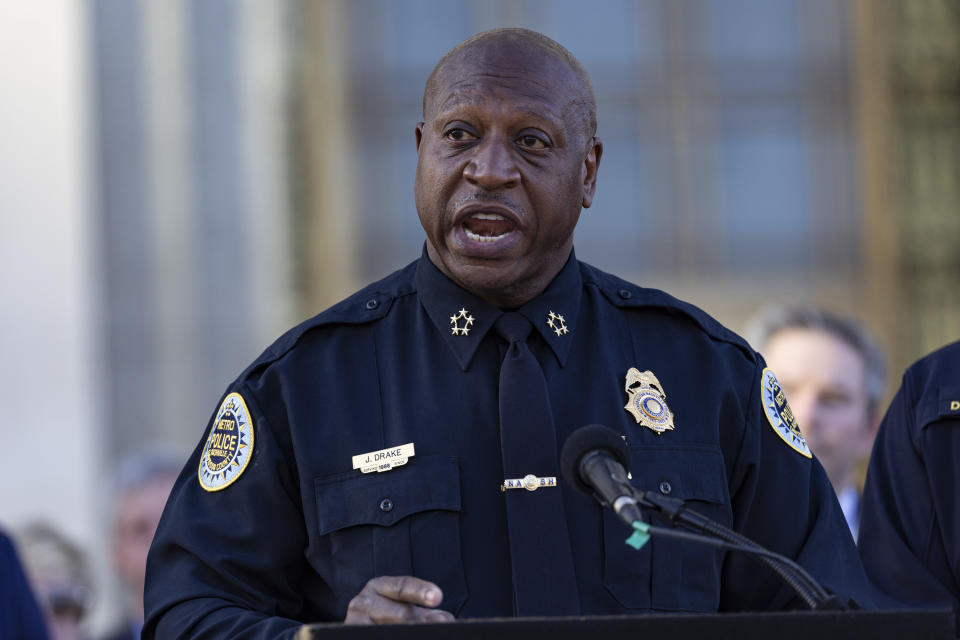 FILE - Nashville Police Chief John Drake speaks, March 29, 2023, in Nashville, Tenn. The Nashville police chief has spent much of his career trying to steer young people away from crime, but was unable to keep his own son out of trouble. John C. Drake Jr. stands accused of shooting two police officers outside of a Dollar General store in the nearby city of La Vergne, Tenn., Saturday afternoon, Oct. 21. He was still the subject of a manhunt on Monday, Oct. 23, and police said they consider him to be armed and dangerous. (AP Photo/Wade Payne, File)