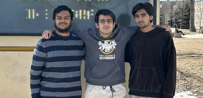 Winners Hamza, Zaid and Haider pose in front of their school, Fort Richmond Collegiate, in Winnipeg (CNW Group/Ducks Unlimited Canada)