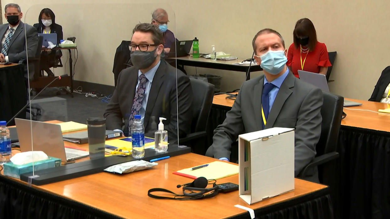 IMAGE: Defense attorney Eric Nelson and Derek Chauvin in court (Pool via NBC News)