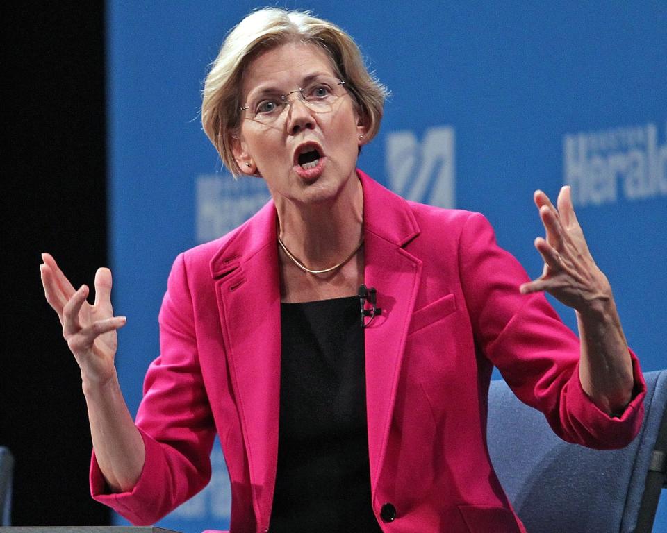 Democratic challenger Elizabeth Warren gestures during her debate against Republican U.S. Sen. Scott Brown, sponsored by the Boston Herald, at the University of Massachusetts in Lowell, Mass., Monday, Oct. 1, 2012. (AP Photo/The Boston Herald, Matt Stone, Pool)