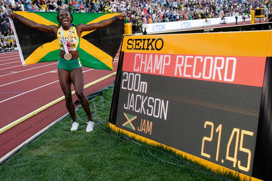 Gold medalist Shericka Jackson of Jamaica celebrates after running the fastest women’s 200-meter time ever at a World Championship meet.