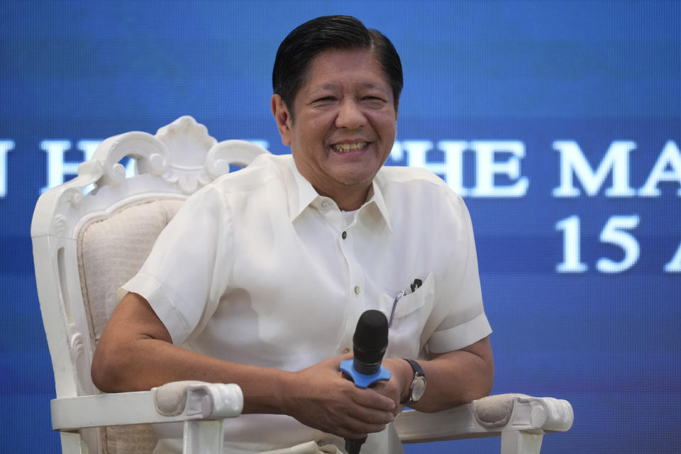 Philippine President Ferdinand Marcos Jr. smiles as he attends a forum of the Foreign Correspondents Association of the Philippines on Monday, April 15, 2024, in Manila, Philippines. (AP Photo/Aaron Favila)