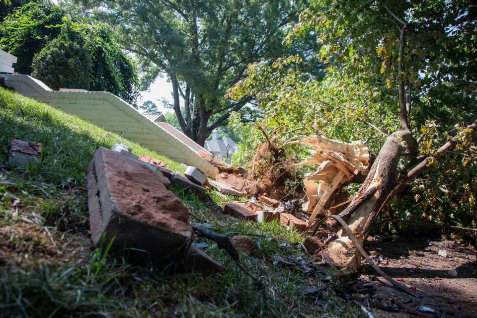 Two people died and two others injured during a wreck in Charlotte’s Eastover neighborhood early Sunday, police said. The vehicle hit the curb on Colville Road, then veered into brick steps and a tree, shown on Monday, August 2, 2021.