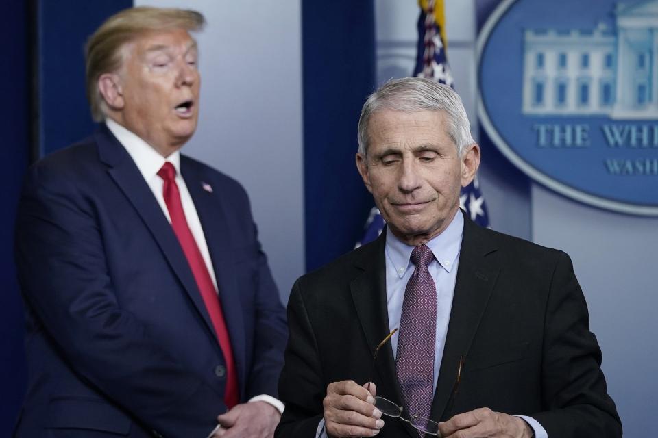 Dr. Anthony Fauci, director of the National Institute of Allergy and Infectious Diseases, and U.S. President Donald Trump participate in the daily coronavirus task force briefing at the White House on April 22, 2020, in Washington, D.C.