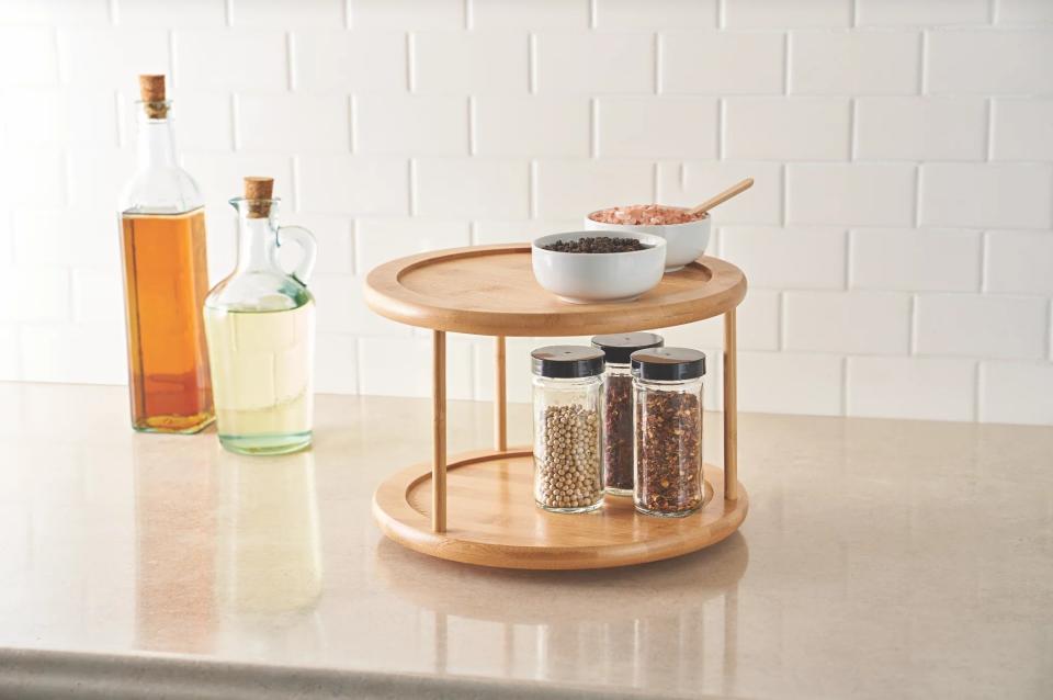 the bamboo turntable with spices on it