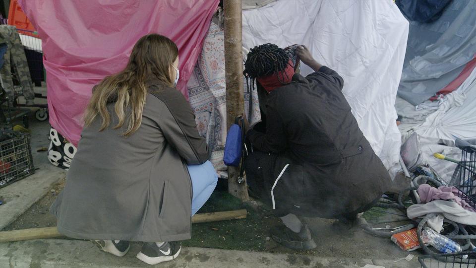 Catherine Parsekian, at left, and Jessica Jimenez check on homeless patients