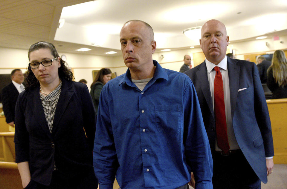 Plaintiff David Meehan, center, leaves the courtroom with his attorney Rus Rilee, right, and victim specialist Joelle Wiggin during Meehan's trial at Rockingham Superior Court in Brentwood, N.H., April 10, 2024. The jury found the state liable for abuse at its youth detention center and awarded the sum to Meehan, a former resident who says he was beaten and raped as a teen. (David Lane/Pool Photo via AP)