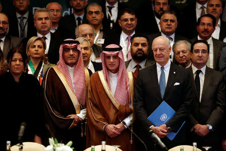 Saudi Foreign Minister Adel al-Jubeir (C) poses for a group photo during a Syrian opposition meeting in Riyadh, Saudi Arabia, November 22, 2017. REUTERS/Faisal Al Nasser