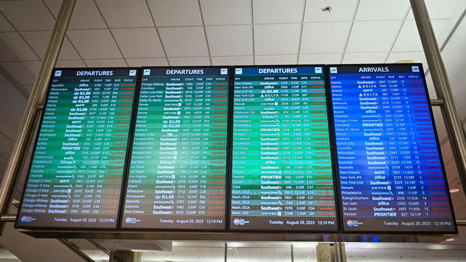 A flight display board shows all flights canceled at Tampa International Airport in Florida on August 29. - Miguel J. Rodriguez Carrillo/AFP/Getty Images