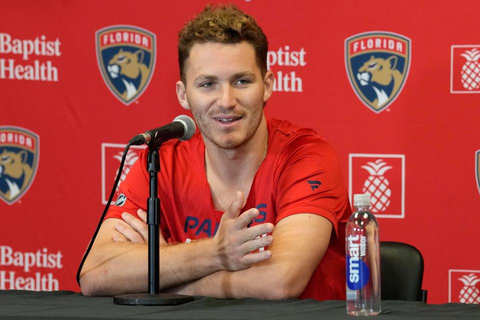 Matthew Tkachuk speaks Wednesday during the Panthers' media day in Sunrise.